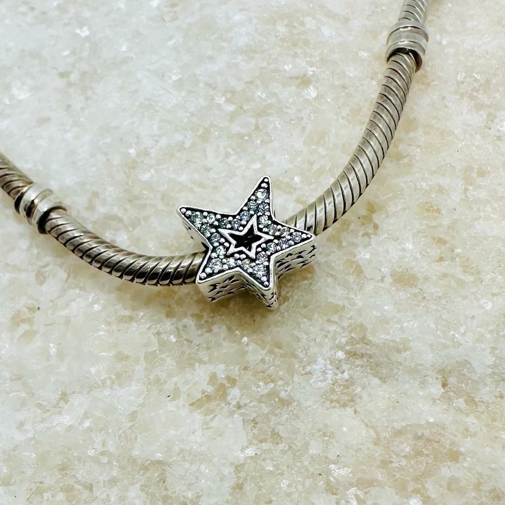 EUC Pandora 790016C01 Sterling Silver Asymmetric Star Charm w/ Clear CZ’s
